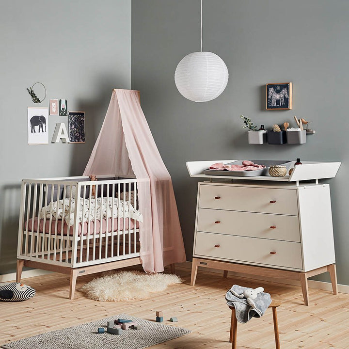 LEANDER Luna Dresser, White in a nursery with blue walls