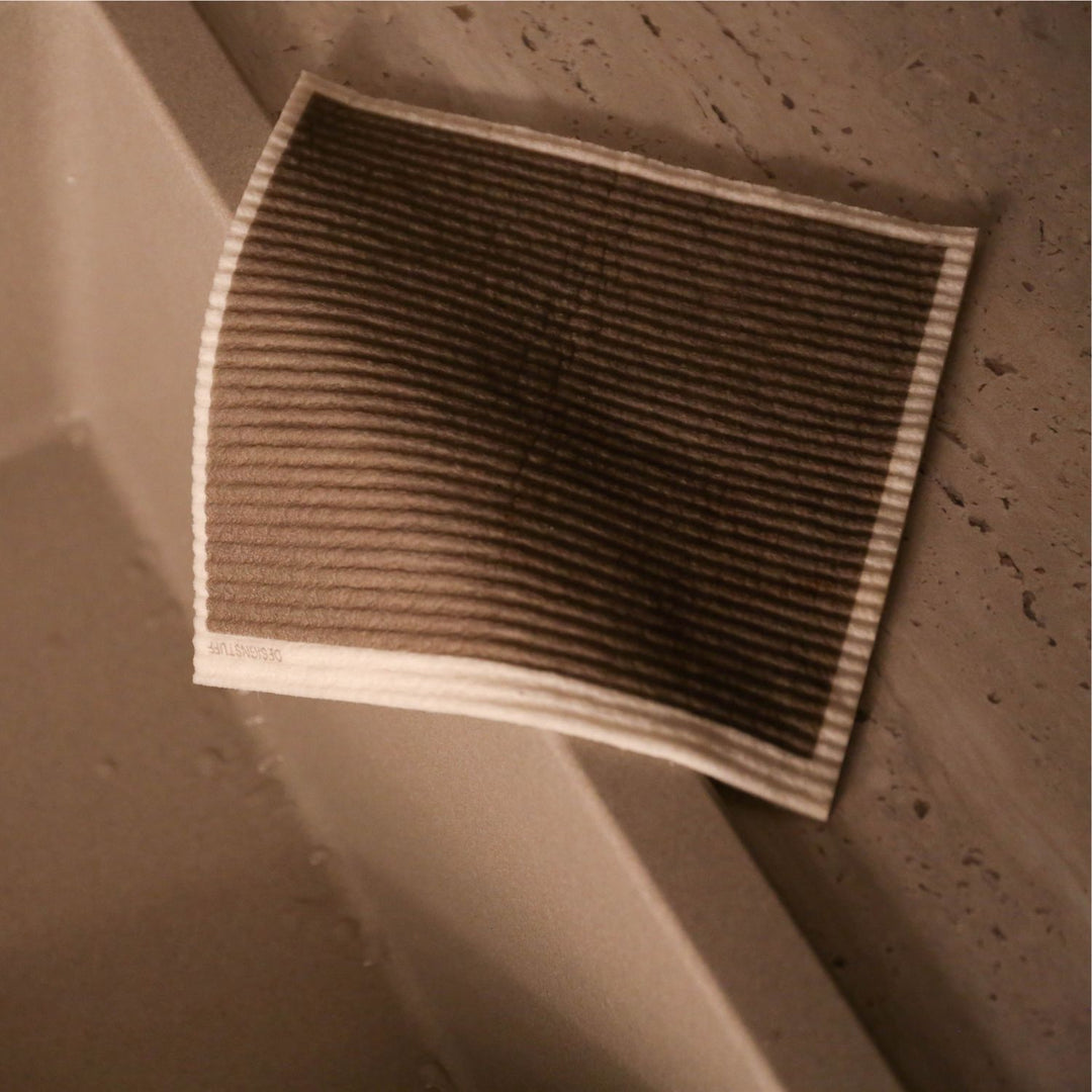 Khaki Designstuff Dishcloth by a sink