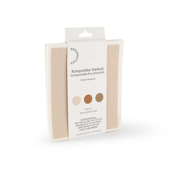 Set of 3 Designstuff Compostable Eco Dishcloths in Sand, Cinnamon and Khaki in their packaging.