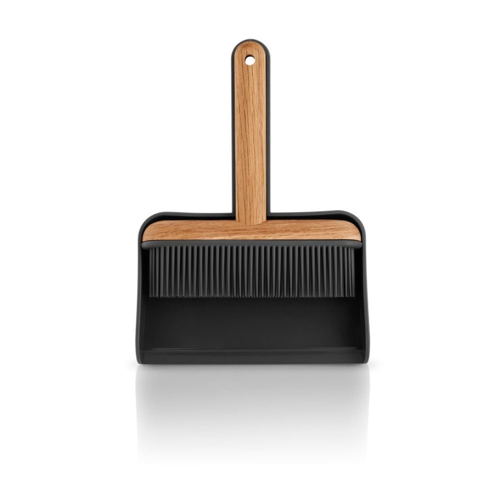 White background, studio lighting, perspective view of a small, wooden brush attached to a black plastic dustpan.