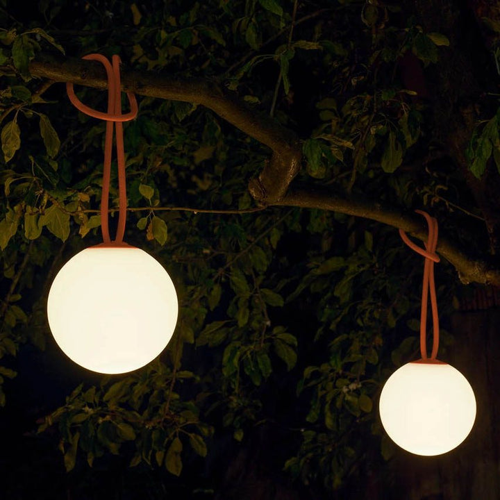 Bolleke portable and rechargeable pendant lamp is designed for indoor and outdoor use.