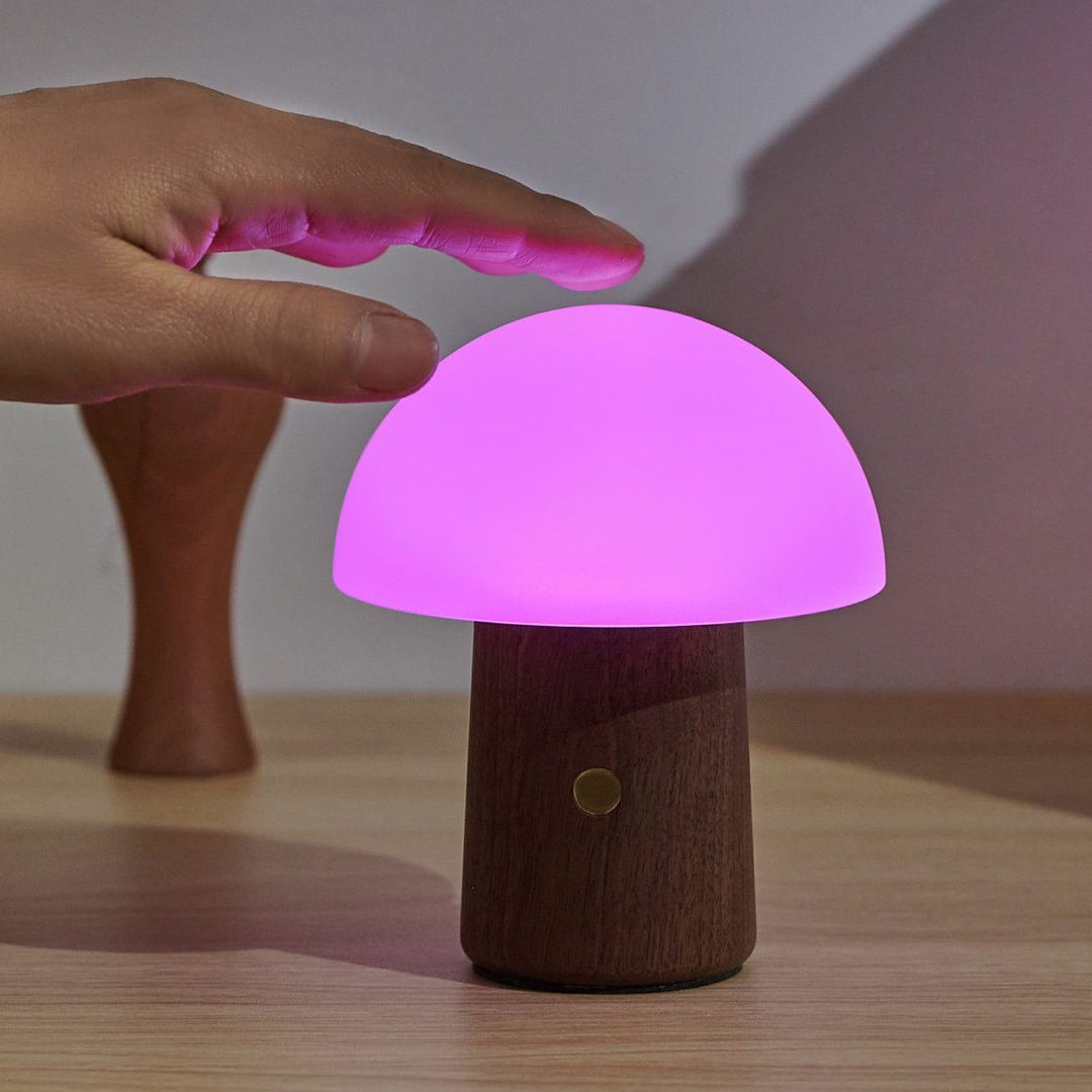 Mini Alice mushroom shaped portable night light with seven vivid colours with a gentle tap to set a calming and relaxing mood.