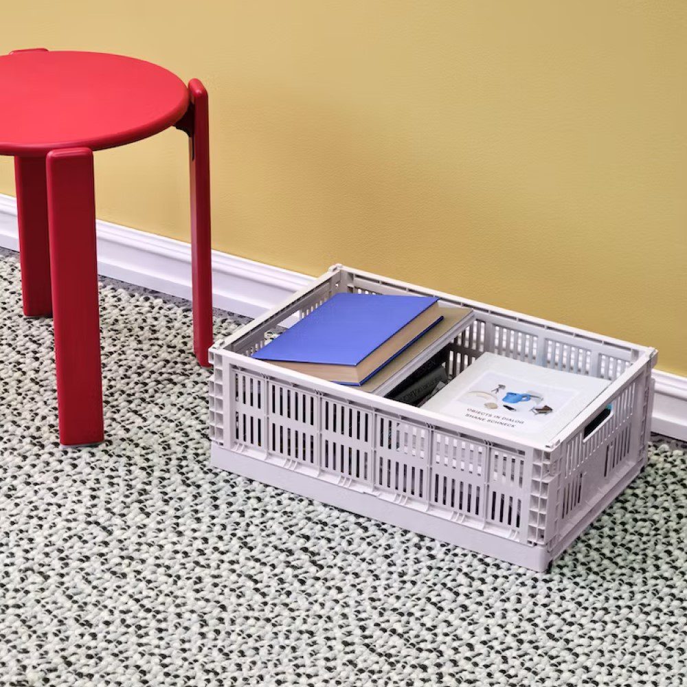 studio lighting, perspective view of a rectangular-shaped tray filled with books