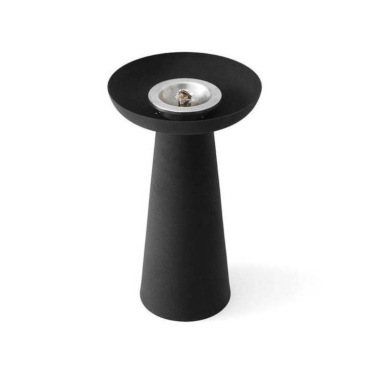 The outdoor flame made from powder-coated steel Meira Oil Lantern by Menu in black.