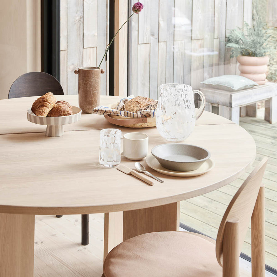 Round Kotai dining table is a beautiful piece in any room, made of solid, white-pigmented oak.