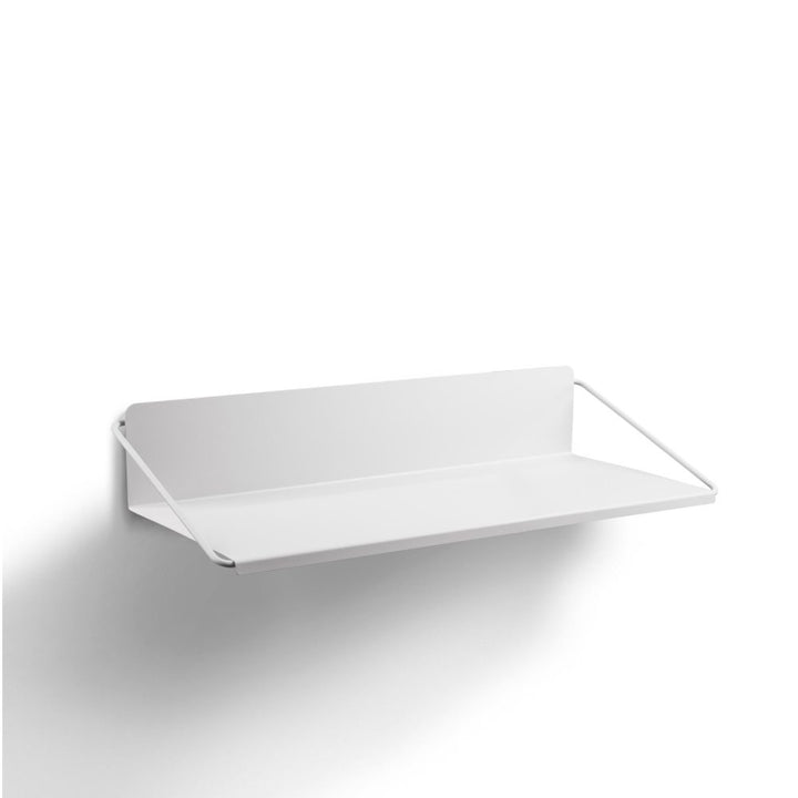 White background, studio image, perspective view of a grey, rectangle-shaped, wall-mounted metal desk.