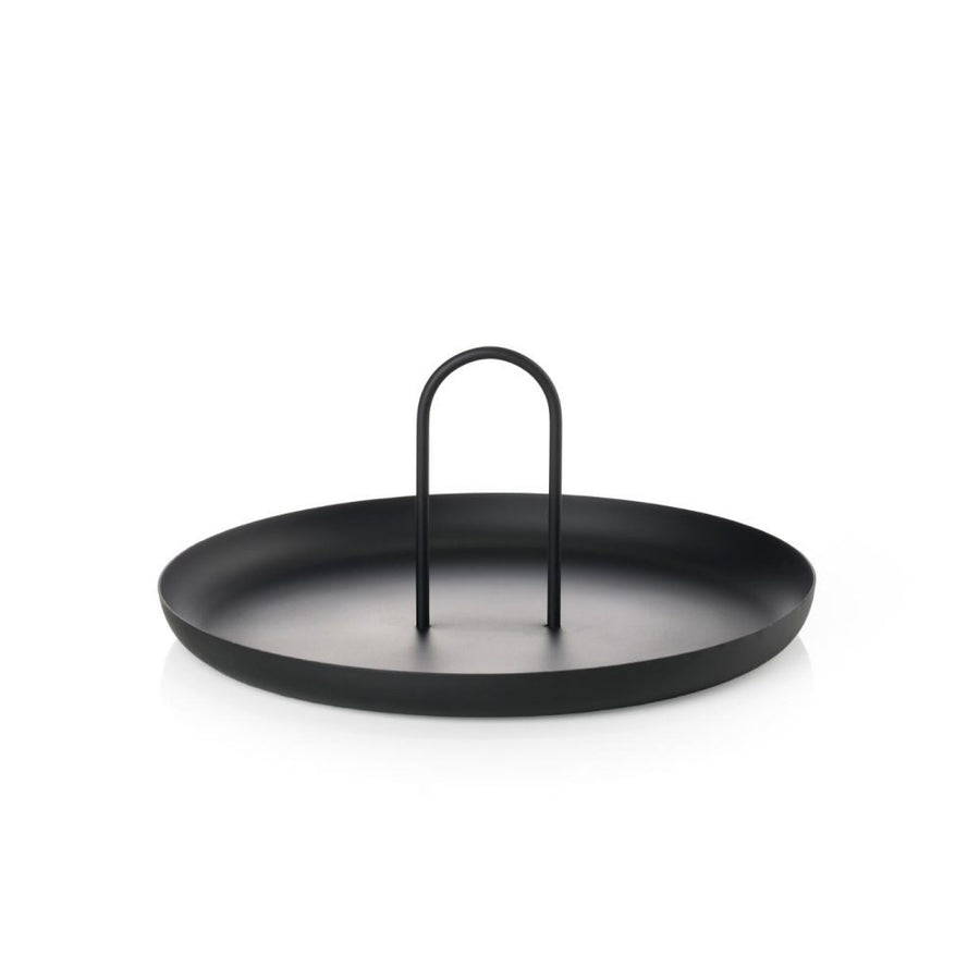 Studio lighting, white background, perspective view of a black circular platter with an arc-shaped handle in the middle